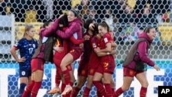 FILE - Spain team members celebrate following their extra time win at the Women's World Cup quarterfinal soccer match against the Netherlands in Wellington, New Zealand, Aug. 11, 2023. 