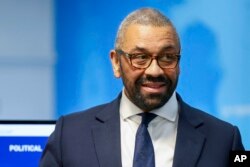 British Foreign Secretary James Cleverly attends a meeting with teams coordinating the evacuation of British nationals from Sudan, at the FCDO Crisis Centre, in London, April 25, 2023.