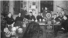 Members of the Whitechapel Club pose at Koster's Saloon, Chicago, Illinois, circa 1890-1895.