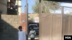 FILE - South Asian students leaving their compound to do some grocery shopping, photo taken on May 24, 2024, Osh, Kyrgyzstan.