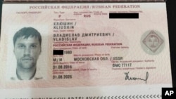 FILE - A Russian passport of Vladislav Klyushin was part of the government evidence entered in Klyushin's trial. Klyushin was one of eight Russians who were part of the prisoner exchange with the U.S. on Aug. 1, 2024.
