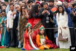 Guests arrive before President Joe Biden and first lady Jill Biden welcome India's Prime Minister Narendra Modi during a State Arrival Ceremony on the South Lawn of the White House, June 22, 2023, in Washington.