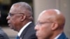 FILE - U.S. Secretary of Defense Lloyd Austin, left, and Chairman of the Joint Chiefs of Staff Air Force Gen. Charles Brown, participate in a virtual Ukraine Defense Contact Group meeting at the Pentagon, outside Washington, Nov. 22, 2023.