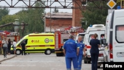 Ambulances are seen near the Zagorsk Optical-Mechanical Plant following a blast on its territory, in Sergiev Posad in the Moscow Region, Russia, Aug. 9, 2023. 
