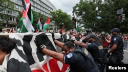 U.S. Capitol Police officers clash with pro-Palestinian demonstrators, on the day Israeli Prime Minister Benjamin Netanyahu addresses a joint meeting of Congress, on Capitol Hill, in Washington, July 24, 2024.