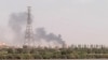 FILE - A picture taken from Omdurman shows smoke billowing north of Khartoum, Sudan, July 22, 2023, as fighting between the country's army and a rival military faction continues.
