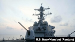 The Arleigh Burke-class guided-missile destroyer USS Milius (DDG-69), deployed to the U.S. 7th Fleet area of operations, conducts underway operations, at an undisclosed location in South China Sea, in this picture released April 10, 2023. (U.S. Navy/Handout via Reuters)