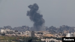 Smoke rises from Gaza, amid the ongoing conflict between Israel and the Palestinian Islamist group Hamas, as seen from Israel's border with Gaza, in southern Israel, March 17, 2024.