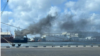 This screen capture of a picture shared by X user Iran Spectator shows the Turkish-owned cargo ship Yaf Horizon, which caught fire while docked at the Port of Haifa, in Israel, on June 10, 2024.