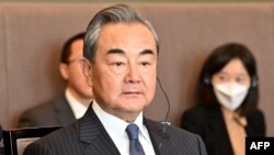 Chinese senior diplomat Wang Yi attends a meeting at the Foreign Office in Budapest, Hungary, Feb. 20, 2023.