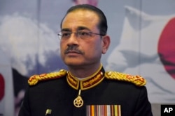 FILE - Then-Pakistan army Lt. Gen. Asim Munir attends a ceremony in Islamabad, Pakistan, Nov. 1, 2022.