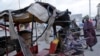 FILE - A destroyed tuktuk sits outside the Pearl Beach hotel in Mogadishu, Somalia, on June 10, 2023. State media said extremists attacked the hotel. The Somali government said on Sept. 6, 2023, that it is shifting tactics in its fight against al-Shabab militants. 