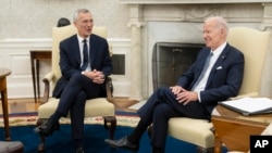 President Joe Biden meets with NATO Secretary General Jens Stoltenberg in the Oval Office of the White House, June 13, 2023.