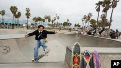 Expert skateboarder Di'Orr Greenwood, an artist born and raised in the Navajo Nation in Arizona, exits the concrete bowl in the Venice Beach neighborhood in Los Angeles, March 20, 2023.