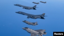 U.S. Air Force B-1B bombers, F-16 fighter jets and South Korean Air Force F-35A take part in a joint air drill, South Korea, March 19, 2023. (South Korean Defense Ministry/Handout via Reuters) 