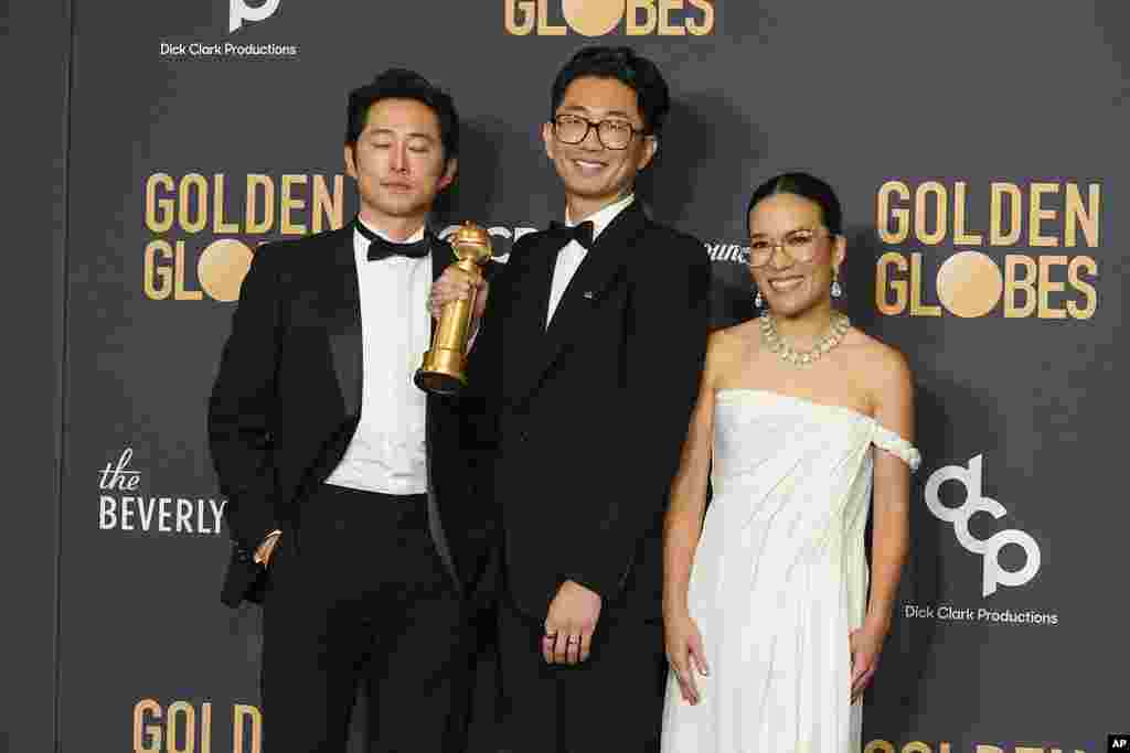 Steve Yeun, from left, Lee Sung Jin, and Ali Wong pose in the press room with the award for best television limited series, anthology series or motion picture made for television for &quot;Beef&quot; at the 81st Golden Globe Awards on Jan. 7, 2024,&nbsp;