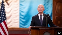 FILE - U.S. Homeland Security Secretary Alejandro Mayorkas takes part in a news conference at the National Palace in Guatemala City, March 21, 2024.