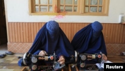 Afghan women attend tailoring class at the Skills Academy for Needy Aspirants (SANA) in Peshawar, Pakistan July 13, 2023. (REUTERS/Fayaz Aziz)