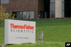 FILE - The exterior of Thermo Fisher Scientific Inc., in Waltham, Mass., Apr. 26, 2007.