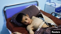 FILE - A 12-year-old injured during a recent earthquake receives treatment at a hospital in Herat, Afghanistan, on Oct. 11, 2023. The World Health Organization said on Oct. 20 that the survivors of the series of quakes desperately need essential health services.