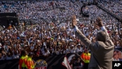 The leader of Inkatha Freedom Party, Velenkosi Hlabisa, waves to the crowd during an election rally in Richards Bay, near Durban, South Africa, May 26, 2024.