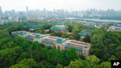 FILE - A view of a portion of the campus of Wuhan University in Wuhan, Hubei province, China, April 11, 2020. The number of American students studying in China has dropped dramatically in recent years.