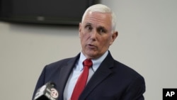 FILE - Former Vice President Mike Pence speaks with reporters in North Charleston, South Carolina, March 2, 2023.