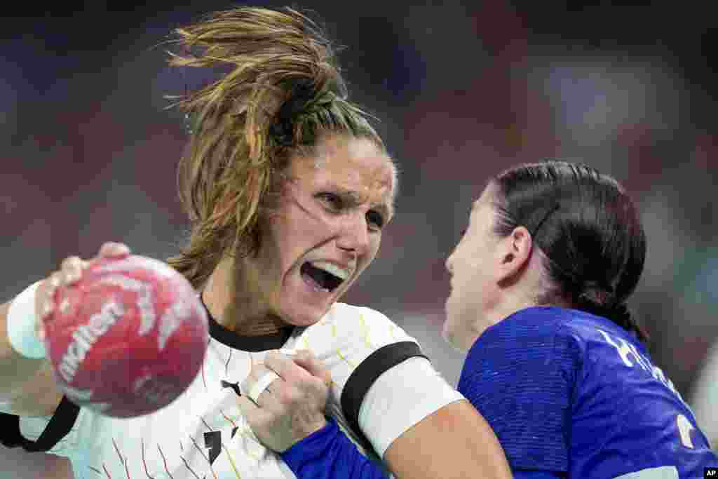 Germany's Xenia Smits is in action during a quarterfinal handball match between France and Germany at the 2024 Summer Olympics in Villeneuve-d'Ascq, France.