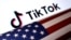 FILE - A U.S. flag is displayed alongside a TikTok logo in this illustration photo taken March 20, 2024.
