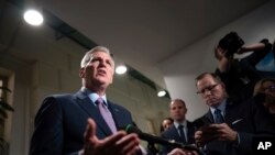 Speaker of the House Kevin McCarthy, talks to reporters after a closed-door meeting with House Republicans after Rep. Matt Gaetz filed a motion to oust McCarthy from his leadership role, at the Capitol in Washington, Oct. 3, 2023.