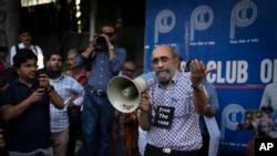 Paranjoy Guha Thakurta, a senior journalist and columnist associated with NewsClick, and one of the 46 people detained by Delhi police Tuesday, speaks during a protest at the press club of India in New Delhi, India, Oct. 4, 2023.