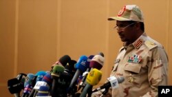 FILE - Gen. Mohammed Hamdan Dagalo, the deputy head of the military council speaks at a ceremony in Khartoum, Aug. 4, 2019. Sudan's government said it will send a delegation to Cairo for discussions with U.S. and Egyptian officials on Monday, 