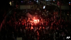 People protest against Israeli Prime Minister Benjamin Netanyahu's government and call for the release of hostages held in the Gaza Strip by the Hamas militant group in Tel Aviv, Israel, April 27, 2024.