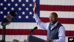 U.S. Senator Raphael Warnock, a Democrat from Georgia, speaks before U.S. President Joe Biden at a campaign rally at Pullman Yards in Atlanta, Georgia, March 9, 2024.