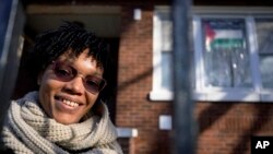 FILE - Cydney Wallace poses for a photo in Chicago, Nov. 28, 2023. 