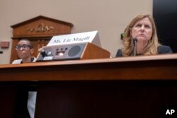 FILE - Then-University of Pennsylvania President Liz Magill listens during a hearing of the House Committee on Education on Capitol Hill, Dec. 5, 2023, in Washington. She resigned after criticism of her answer on antisemitism on campus. (AP Photo/Mark Schiefelbein)