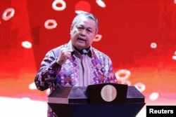 Gubernur Bank Indonesia Perry Warjiyo berbicara pada pertemuan tahunan bank sentral Indonesia dengan pemangku kepentingan keuangan di Jakarta, 30 November 2022. (Foto: REUTERS/Willy Kurniawan)