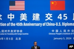 Chinese Foreign Minister Wang Yi speaks during a reception for Commemoration of the 45th Anniversary of China-U.S. Diplomatic Relations at the Diaoyutai Guest House in Beijing, Jan. 5, 2024.