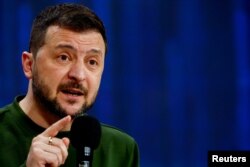 “Terror sodir etilganidan bir kun o’tib ham bu arzimas Putin o’z xalqi bilan shug’ullanish, murojaat bilan chqish o`riniga bir sutka sukut saqladi", - deydi Ukraina rahbari Volodimir Zelenskiy