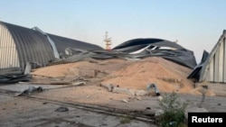A grain warehouse destroyed by a Russian drone strike is seen in a sea port, amid Russia's attack on Ukraine, in Odesa Region, Ukraine, July 24, 2023. Press Service of the Operational Command South of the Ukrainian Armed Forces/Handout via Reuters