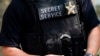 FILE - A Secret Service agent is pictured in New York, July 20, 2022. An independent panel has concluded that because of a static internal culture, the agency "does not perform at the elite levels needed to discharge its critical mission." 