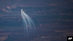 An Israeli shelling hits an area in Lebanon next to the Israeli-Lebanese border at the Galilee region as seen from the Israel-annexed Golan Heights, Aug. 5, 2024. 