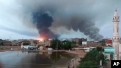 FILE - Smoke rises over Khartoum, Sudan, June 7, 2023, as the fighting in the northeastern African nation showed no signs of abating.
