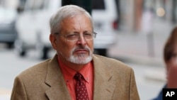 FILE - In this July 9, 2015 photo, Michael Geilenfeld arrives at U.S. Bankruptcy Court, in Portland, Maine. The founder of a orphanage in Haiti is facing criminal charges in the U.S. for allegedly traveling there to engage in sex acts with minors. 