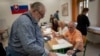 Slovakia’s Pro-West, Pro-Russia Parties in Tight Race, Exit Polls Say 