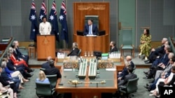 Philippines President Ferdinand Marcos Jr., top left, delivers an address to members and senators at Parliament House in Canberra, Australia, Feb. 29, 2024. (Lukas Coch/AAP Image via AP)