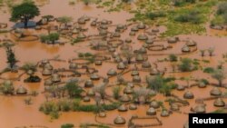 An aerial view shows a deserted and flooded traditional homestead following heavy rains in Garsen, Tana Delta within Tana River county, Kenya, Nov. 23, 2023. 