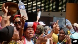 Demonstrators gather to protest the water crisis in Mamoudzou, on the French Indian Ocean territory of Mayotte, Sept. 27, 2023. A movement called ’’Mayotte is Thirsty″ is demanding accountability for alleged embezzling, leaks and lack of investment in sustainable water supplies.