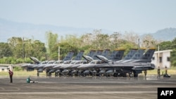 FILE - U.S. Air Force F-16 fighter jets are parked during a U.S.-Philippines joint air force military exercise at Basa Air Base in Pampanga, Philippines, on April 11, 2024.