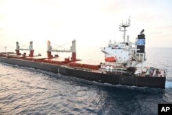 FILE - This Indian navy photo shows the U.S.-owned Genco Picardy, which was attacked Jan. 17, 2024, by a bomb-carrying drone launched by Houthi rebels in the Gulf of Aden. U.S. Central Command forces struck a Houthi anti-ship missile aimed at the Gulf of Aden on Saturday.